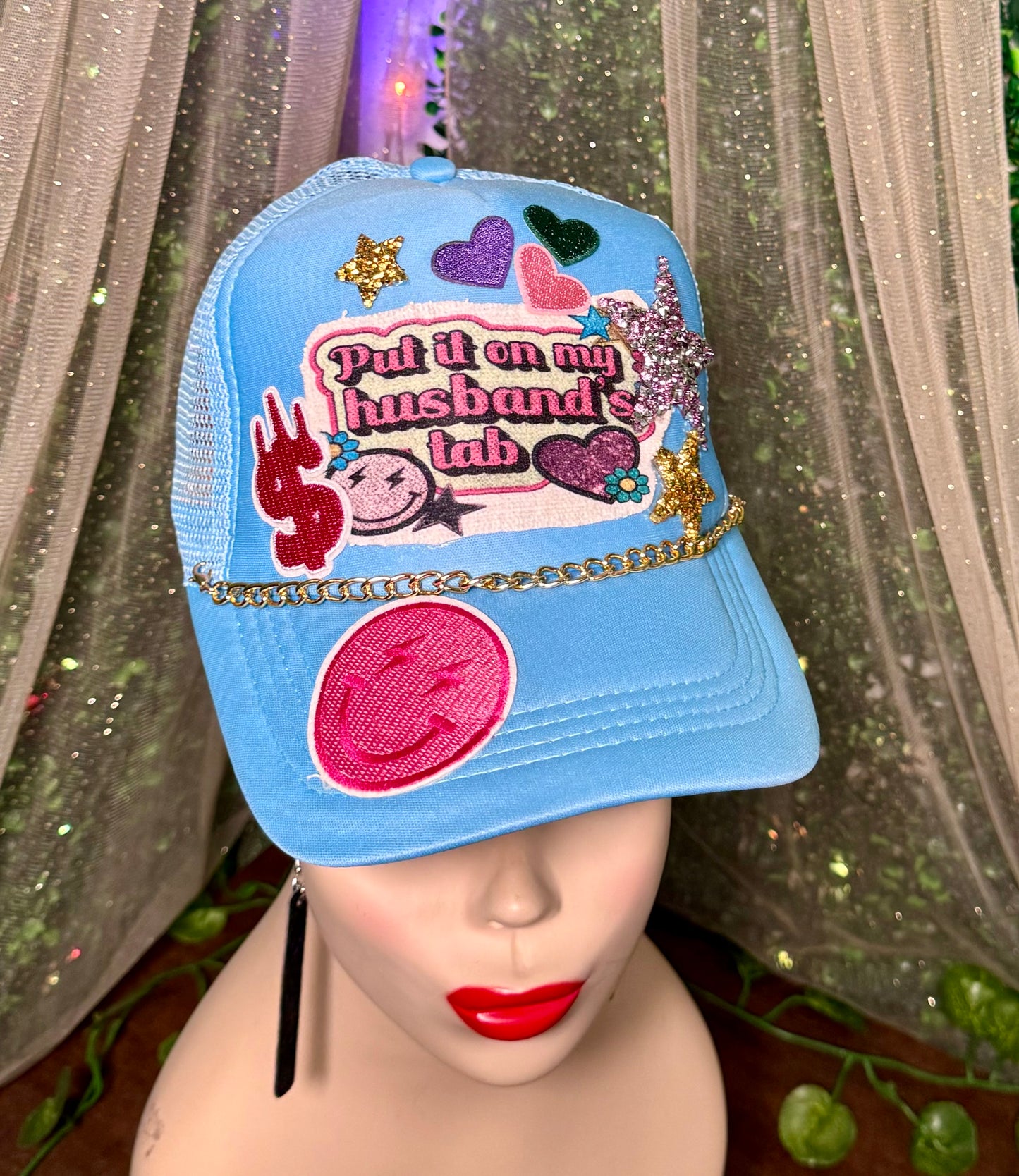 Put It On My Husbands Tab Trucker Hat
