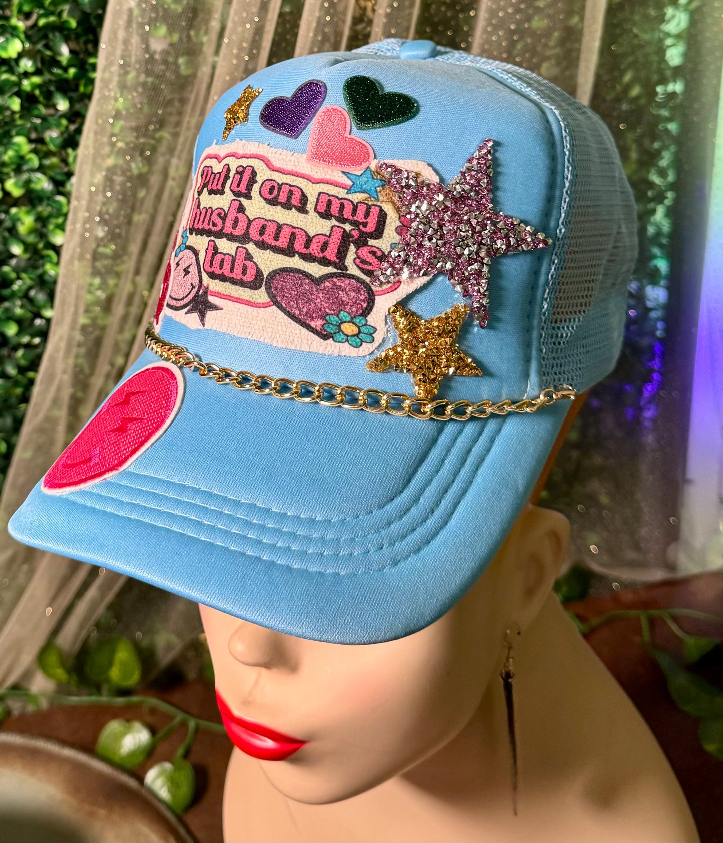 Put It On My Husbands Tab Trucker Hat
