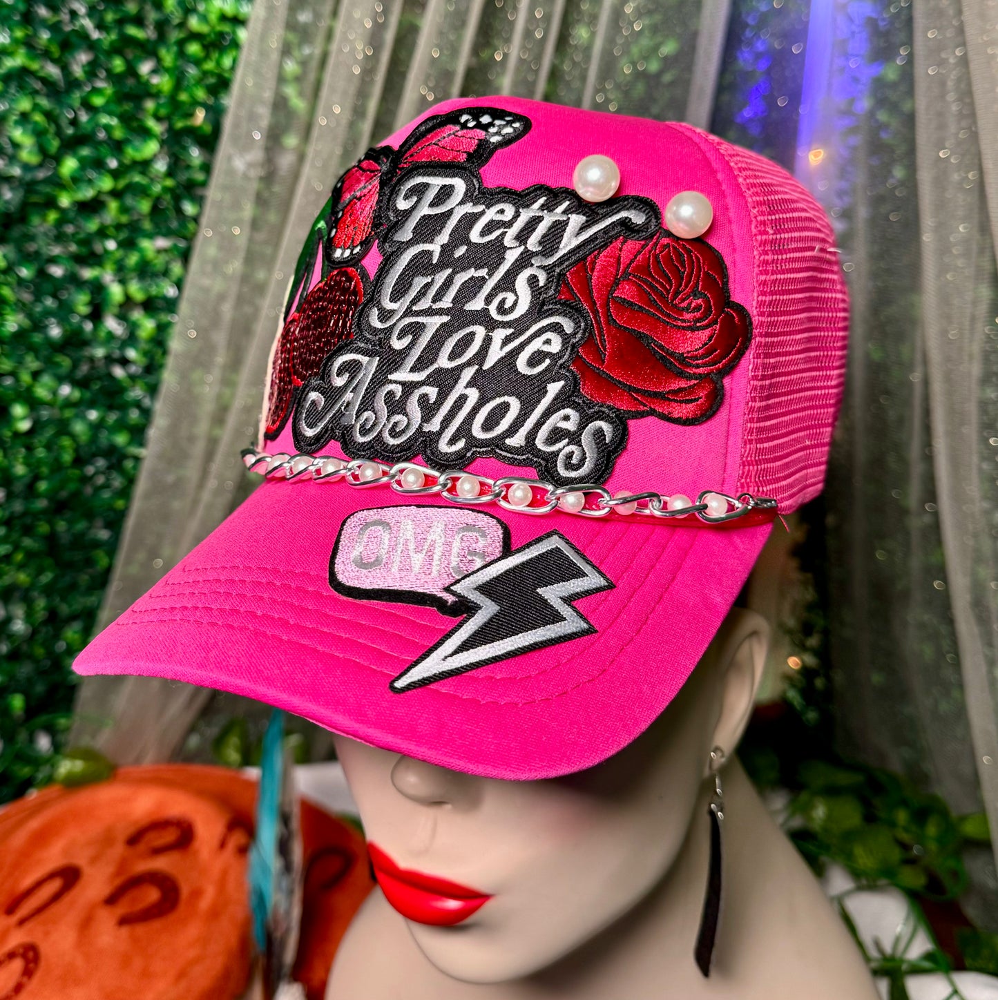 Pretty Girls Love Assholes Trucker Hat